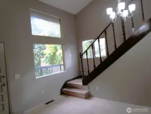 Front Entry, stairs lead up to the loft.