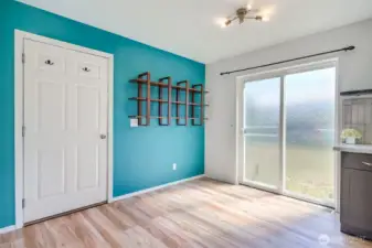 Patio just outside the sliding door, and the door to the garage on the left