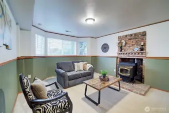 Downstairs is this fabulous bonus room with pellet stove. You'll be warm and toasty this winter!