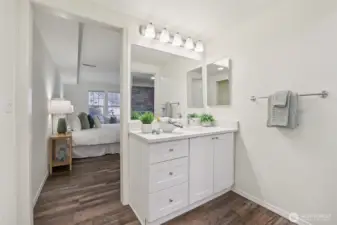 New countertops, sink and faucet in primary bathroom
