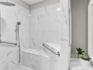 Beautiful, brand new walk in shower! Stunning tile work with built in seating and multiple shower heads make this space feel like a true retreat!