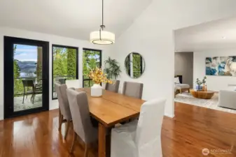 Dining area with large windows and easy access to outdoor entertaining space