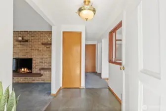 Front entrance showcasing a slate floor and vintage door bell long chimes
