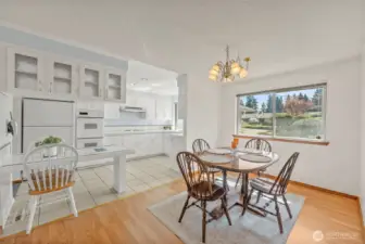 Generous dining space adjoining the kitchen plus eating bar