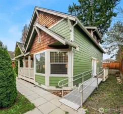 A gentle wheelchair ramp leads to comfort in this ADA accessible home.