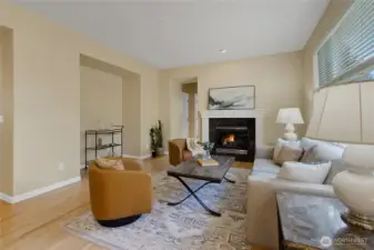 Living room with gas fireplace and seamless connection to the kitchen