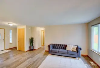 View of the living room look back towards the front door