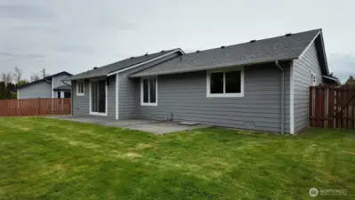 View of fully fenced back yard