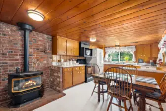 Bright & open kitchen/dining area with your gas stove!