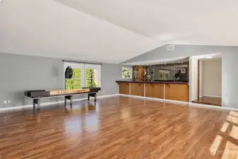HUGE does not begin to explain the size of this rec room with large wet bar