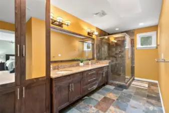 Large bathroom that is connected to the bedroom.