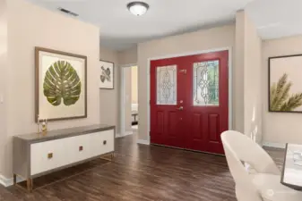 Wide entryway excudes a welcoming charm. Notice the 2nd bedroom. Staging is virtual.