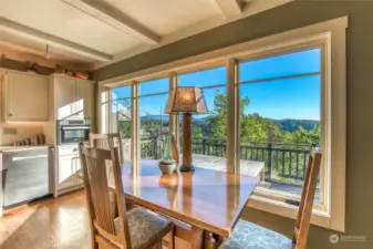 The kitchen and eating area is flooded with natural light. The owners use the Bosch speed oven on a daily basis and love it. Bosch dishwasher also replaced in 2018.