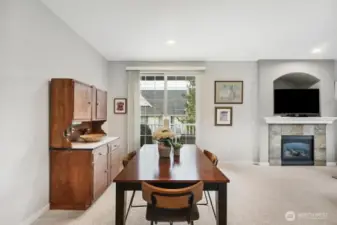 Dining area leading on to the balcony with courtyard views and Westerly sunsets