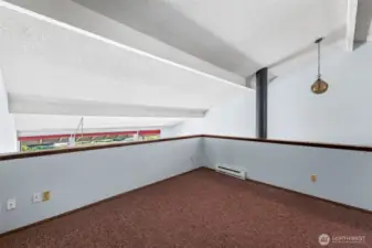 Loft overlooks the LR/DR and enjoys lots of natural light.
