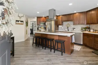 Kitchen with island and eating bar