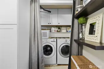 Utility room with storage and office area