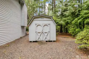 Well-maintained storage shed with electricity ~ perfect for tools, hobbies, or extra space.
