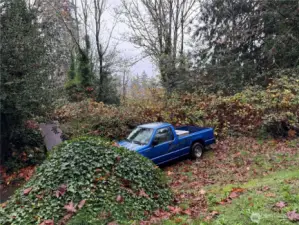 At the top of the driveway tp the left, a third parking area.