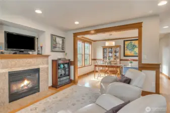 Featuring gleaming hardwood floors and custom millwork.