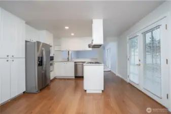 Centrally located between the formal dining and family room, the kitchen provides great flow and convenience.