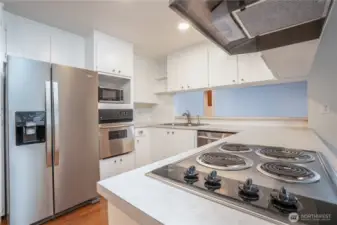 Well-equipped kitchen features generous storage and all appliances included.
