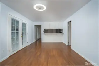 The family room sits right off the kitchen and features French doors leading to the backyard patio.