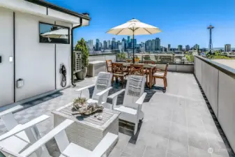 Roof deck showcases the entire city. Enjoy the sun and views.