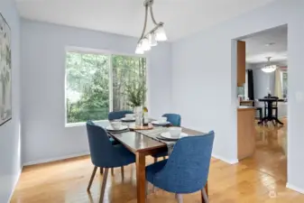 Formal dining room for entertaining, looks out to the greenbelt.