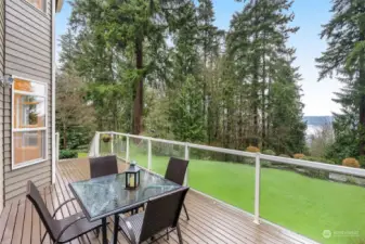 A perfect place to relax or entertain. Enjoy privacy, a spacious and level backyard with firepit area, and of course, the views of the water.