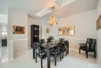 Formal dining / second living space just opposite kitchen - additional casual dining area is found inside kitchen