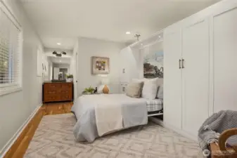 This is the front bedroom with a built in closet system and murphy bed.  Each bedroom has its own private bath as well.