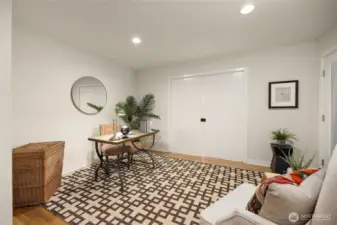 Next to the tv/den is a flex space that has been used as an office and music room. Through the doors there is the entry to the 3rd bedroom. Not shown is a door to the right that leads outside to deck!