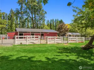 A three stall barn with three paddocks. The paddocks have a hoof grid stystem installed for drainage.