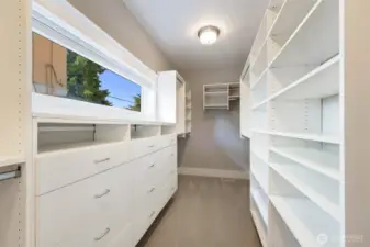 Walk in closet primary bedroom.