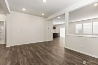 Dining space opens into the joined Great Room and Kitchen; Colors, finishes, and options will vary.