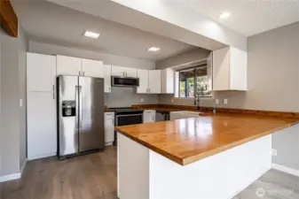 Newer appliances in updated kitchen