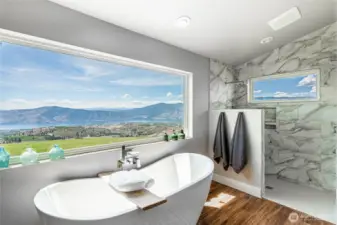 Walk in tiled shower and bath enjoys great daylight