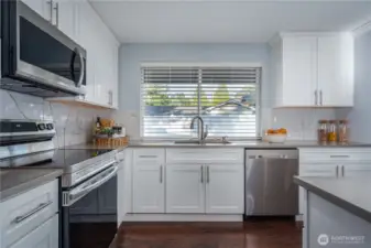 A generous kitchen window connects you to the outdoors.