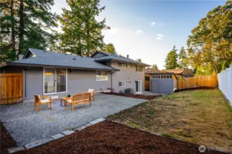 The fully fenced backyard features updated fencing for added privacy.