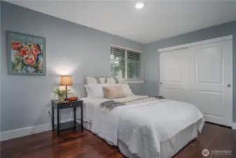 The larger of the two additional upstairs bedrooms features a generous closet.