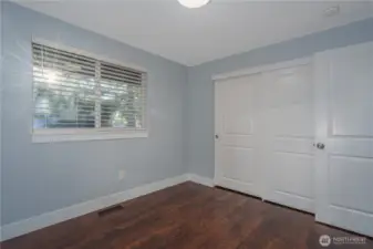 The third upstairs bedroom is light, bright, and roomy with a generous closet.