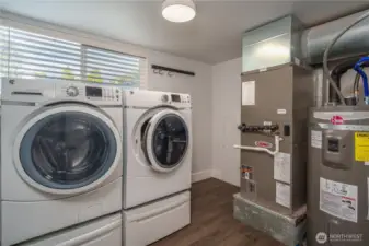 The utility room is located on the lower level; washer and dryer included. The furnace, water heater and A/C are less than three years old!