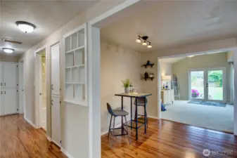 Looking towards front hall to 3 bedrooms, full bathroom, breakfast area, into great room, french door to beautiful spacious backyard.
