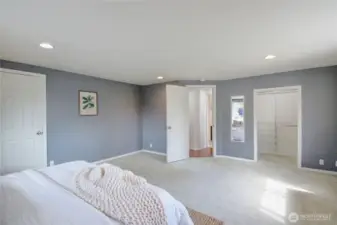Primary bedroom with 2 closets, walk in closet on the right.