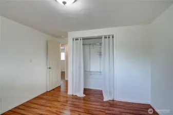 1st bedroom in front hall looking towards closet.