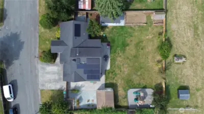 Aerial view of roof and solar panels.  Energy efficient.