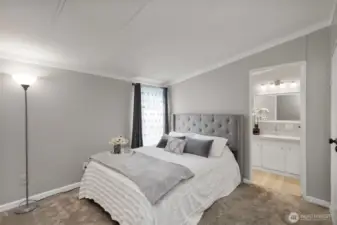 Relax in the primary bedroom with neutral tones, ample closet and private ensuite bath.
