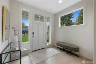 Open and light entry. Photos are of the model home on lot 4 at Bentley.
