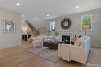 Open, great room with cozy gas fireplace.